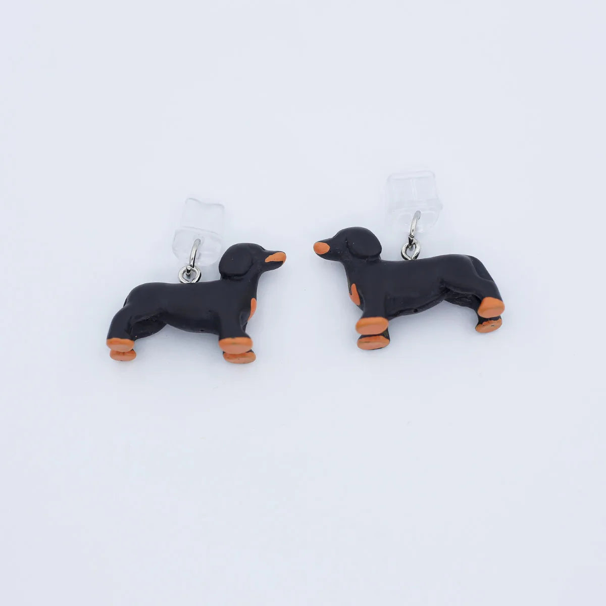 A Three-Dimensional Sausage Dog Resin Phone Dust Plug Hanging Accessory Decoration For Iphone 17 Type-C Port Pendant Lanyard